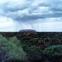 AUS NT AyersRock 1993MAY 014  Raining on the rock. : 1993, Australia, Ayers Rock, May, NT